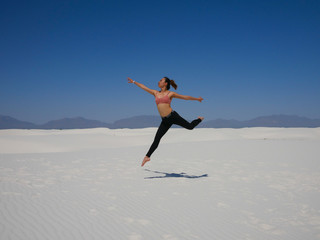 Fototapeta na wymiar Jumping in the Desert