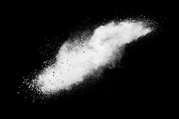 White powder explosion on black background. 