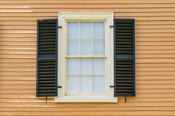 Old Historic Window Exterior with Shutters