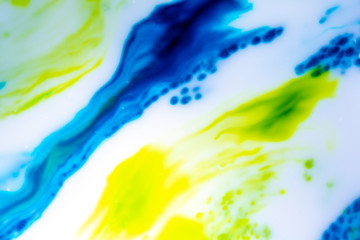 Fototapeta na wymiar Abstract Primary Color Ink Splats Splotches of bright color on a white background. Scientific, artistic look. Spreading color movement. Microscopic look.