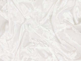 The fabric is white with wrinkles pattern background 