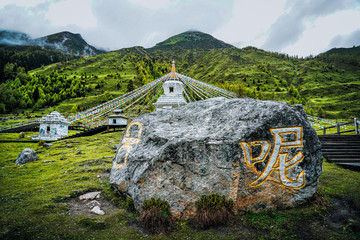 Sichuan Four Girl Mountain (Siguniang Mountain) Shuangqiaogou in Sichuan China, beautiful White tower