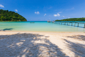 Tropical sea and beach on sunny day.