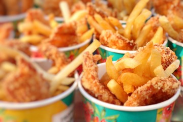 French fries and fried chicken at market