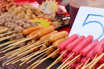 Fried meatballs and sausage at street food