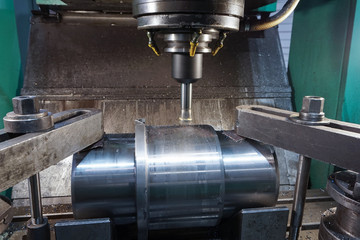 Milling keyway shaft on the CNC machine.