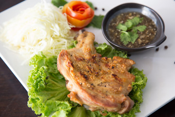 grilled chicken with Thai style dipping spicy sauce for roasted or grilled food (fish sauce and chilli)