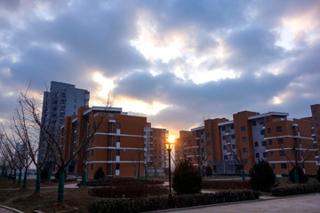 Sunrise in urban living quarters and parks