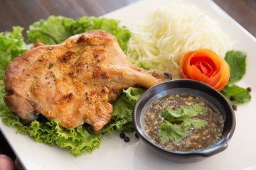 grilled chicken with Thai style dipping spicy sauce for roasted or grilled food (fish sauce and chilli)