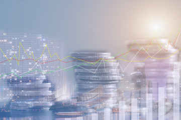 Financial investment concept, Double exposure of city night and stack of coins for finance investor, Forex trading candlestick chart economic , ECN Digital economy.