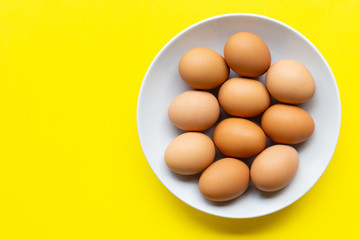 Eggs on yellow background.