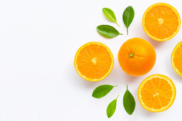 Fresh orange citrus fruit with leaves isolated on white background.