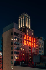 Jesus Saves sign at night, in downtown Los Angeles, California