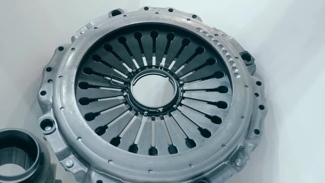 New car clutch basket and disc is show in the exhibition. Shot in motion