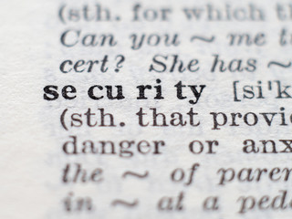 Dictionary definition of word security, selective focus.