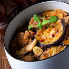 Veal goulash with baked aubergine and herbs