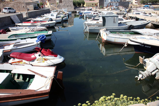 Old boats in harbor at Adriatic sea. Vinjerac, Croatia, popular touristic destination, Croatia 