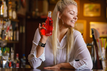 Woman working at the bar counter