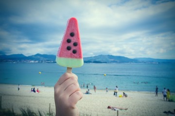 Fototapeta na wymiar watermelon ice cream with beach background