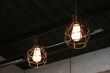 Light bulb incandescent hanging decorative interior room in cafe