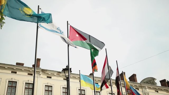 Flags of different countries in the park Cameroon, Kazakhstan, Israel, Jordan, Zambia, Yemen, Egypt, Ecuador Belarus Angola Azerbaijan