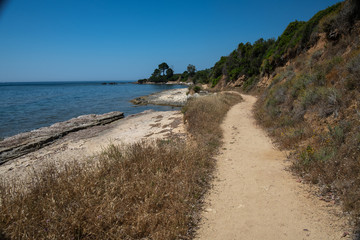 The small path bordering the sea.  Saint Florent - Corsica