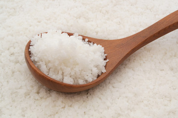 Fototapeta na wymiar Organic sea salt with wooden spoon