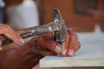 Carpenters work on woodworking machinery in carpentry shops