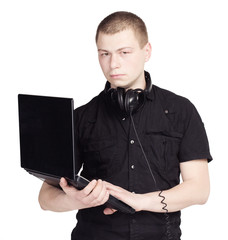 Young Man with notebook and headphones on white background