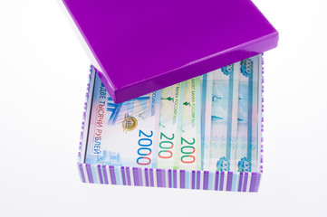 ruble banknotes, Russian currency in  box on white background.  Money saving concept.