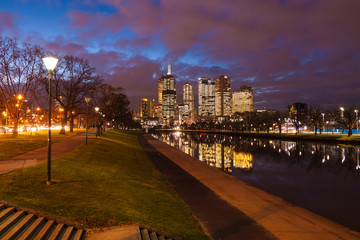 Australia - Victoria - Melbourne - Night panorama of city downtown taken from royal botanic garden along with Yarra river