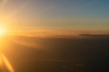 Fototapeta na wymiar View from the plane at dawn