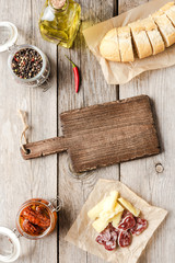 Italian food on wooden background