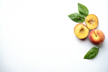 Summertime fruit layout made of sweet ripe peaches on white background. Healthy food, delicious...