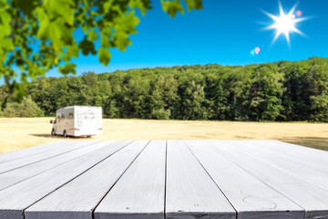 Desk of free space and summer blurred background 