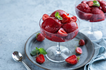 delicious strawberry sorbet in a glass, vegan  low carb berries ice cream