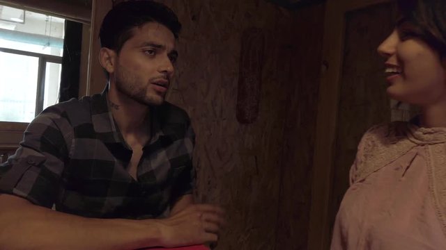 Entrepreneurs casual workers having fun while they cowork on laptop to share ideas plans make dreams and reach impossible with hard-work and teamwork together. 4k handheld 60 fps medium-shot gimbal