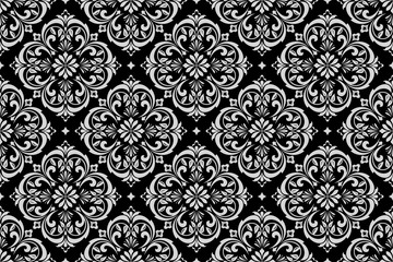 Floral pattern. Vintage wallpaper in the Baroque style. Seamless vector background. Black and grey ornament for fabric, wallpaper, packaging. Ornate Damask flower ornament