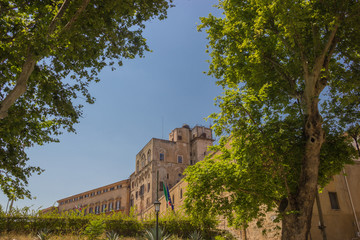 Fototapeta premium Norman palace of Palermo Sicily, view from side of the royal palace complex with trees of the garden