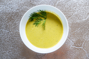 Vegetable soup on stone table