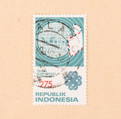 INDONESIA - CIRCA 1983: A stamp printed in Indonesia shows mail across the world, circa 1983