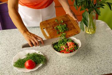 Cooking of organic food. Summer lodge. Fresh air.