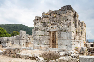 Ancient city of Kaunos, Dalyan valley, Turkey. Kaunos (Latin: Caunus) was a city of ancient Caria and in Anatolia, a few km west of the modern town of Dalyan, Muğla Province, Turkey.