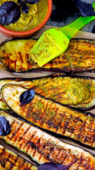 Eggplants with grilled pesto and blue basil. Keto lunch idea. Keto diet. Vegetarian aubergines grilled.