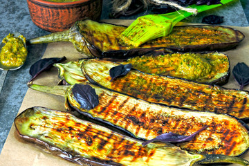 Eggplants with grilled pesto and blue basil. Keto lunch idea. Keto diet. Vegetarian aubergines grilled.