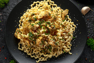 Artichoke hearts and lemon pasta with parmesan cheese and parsley