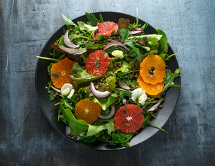 Orange and grapefruit Citrus salad with lentills vertes, wild rocket, arugula, red onion and sprinkle of pumpkin seeds