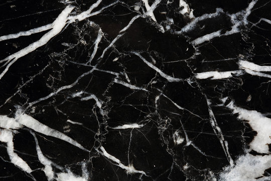 White patterned structure natural of black marble pattern (Marquina) texture for interior, product design. abstract dark background.