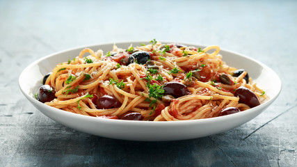 Pasta Alla Puttanesca with garlic, olives, capers, tomato and anchois fish