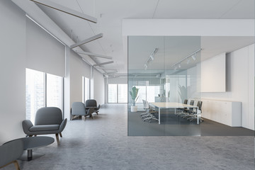 White and glass conference room with screen